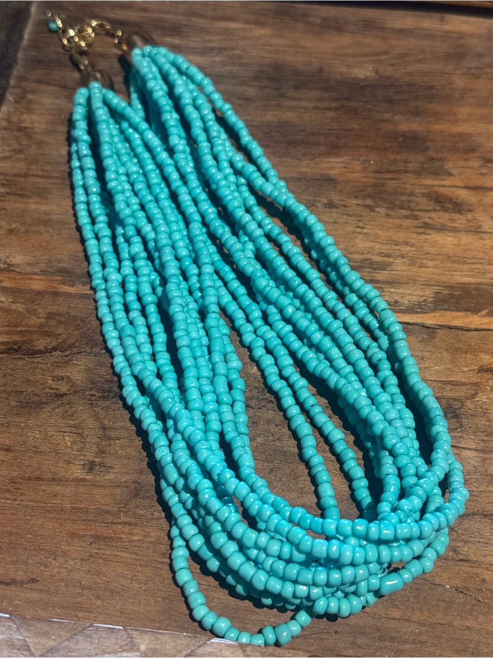 Turquoise colored Multi-Strand Seed Bead Necklace